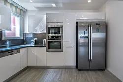 Corner kitchen design with freestanding refrigerator