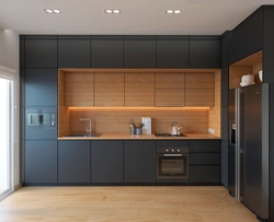 Photo of a corner kitchen with cabinets on only one wall