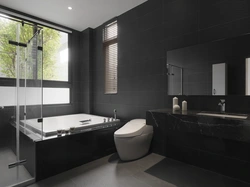 Черная ванна в интерьере ванной комнаты фото