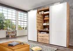 Wall cabinet with TV in the bedroom photo