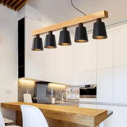 Лампы над столом на кухне фото