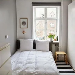 Small bedroom design 6 sq.m. with window