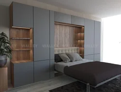 Built-in wardrobes in a bedroom with a bed photo design