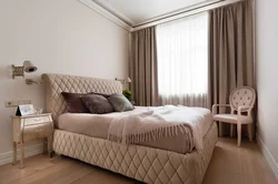 Дизайн спальни с бежевой кроватью фото