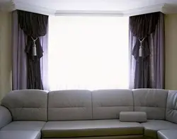 Sofa near the window in the living room photo in modern style