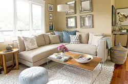 Living room design with sofa in the center