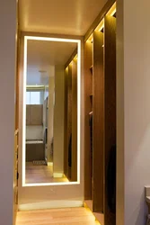 Mirror with lighting in the hallway wall-mounted interior