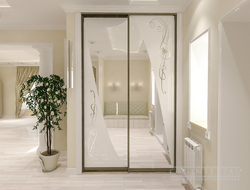 Wardrobe doors with mirror in the hallway photo