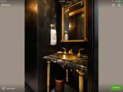 Bathroom interior black and gold