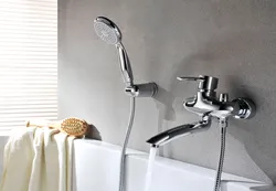 Bathroom faucet with watering can photo