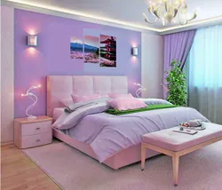 Photo of a bedroom with a flower above the bed