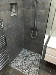 Shower cabin made of tiles design in the apartment