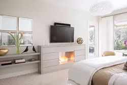 Спальня с камином и телевизором фото