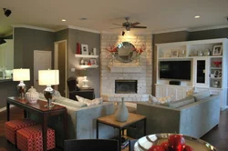 Living room kitchen design with fireplace 20 sq.m.