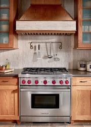 Kitchen with a regular gas stove photo