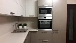 Kitchen design with built-in refrigerator and oven