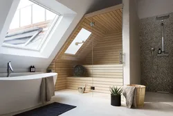 Bathroom design with a window in the attic