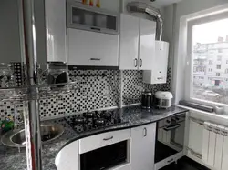 Kitchen Interior With Gas Heater In Khrushchev And Refrigerator