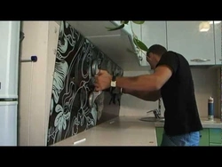 How to glue a panel to a wall in the kitchen photo