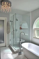 Shower and bathtub in the bathroom photo