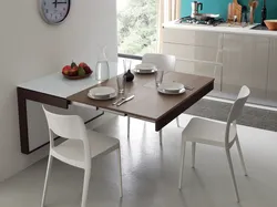 Дизайн кухни с раздвижным столом
