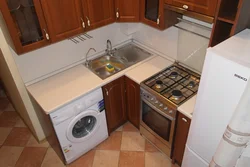 Small corner kitchens photo with gas stove and refrigerator