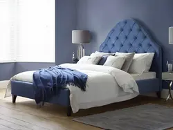 Soft Blue Bed In The Bedroom Interior