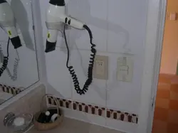 Hairdryer in the bathroom photo