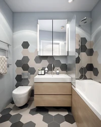 Interior of a small bathroom with toilet tiles