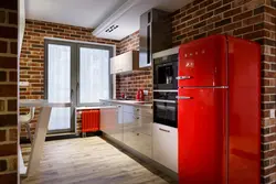 Photo of kitchen interior with red brick