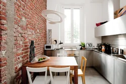 Photo Of Kitchen Interior With Red Brick