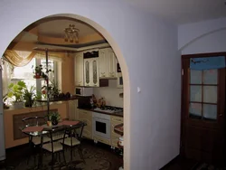 Arch to the kitchen photo in a small apartment