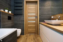 Bathroom design wood and gray tiles