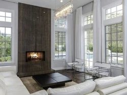 Living room interior with fireplace and 2 windows