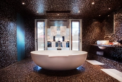 Round bathtub in the bathroom interior