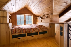 Bedroom design on the second floor of a wooden house