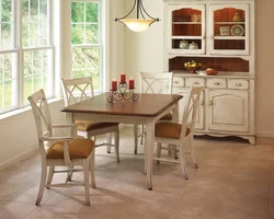 Kitchen with wooden table and chairs in the interior