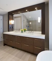 Bath design with large mirror photo