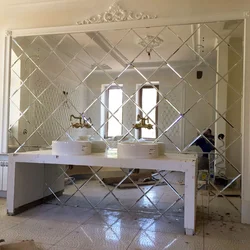 Mirror Tiles On The Wall In The Kitchen Photo