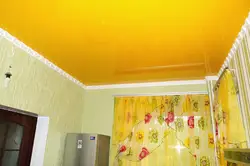 Kitchen with yellow ceiling photo