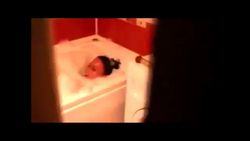 Hidden camera in bath photo