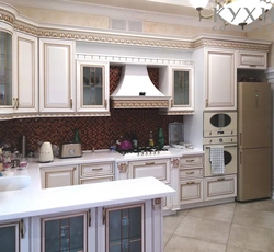 Classic white kitchen with gold patina photo