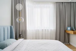 White tulle in the bedroom interior