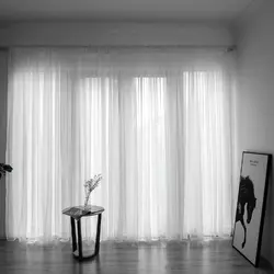 White tulle in the bedroom interior