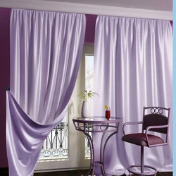 Lilac curtains in the kitchen interior