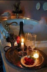 Romantic in the bathroom by candlelight photo