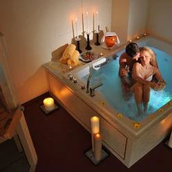 Romantic in the bathroom by candlelight photo