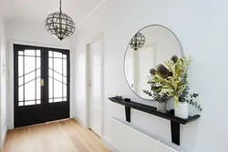 Large mirror in the hallway on the entire wall design