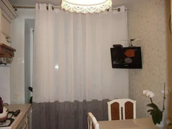 Tulle in a small kitchen in the interior