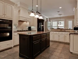 Classic kitchens with dark countertops photo